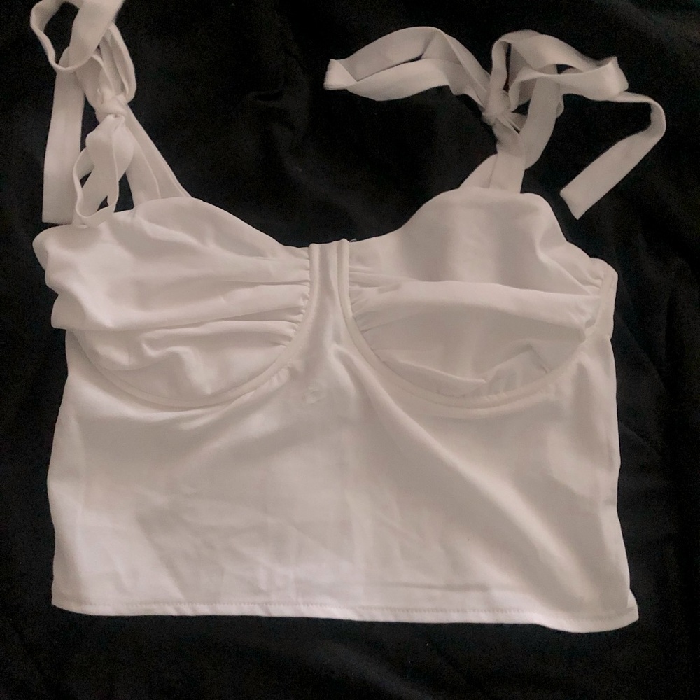 This is a cute cami. I got it also from pacsun but the brand is Kendall & Kylie.